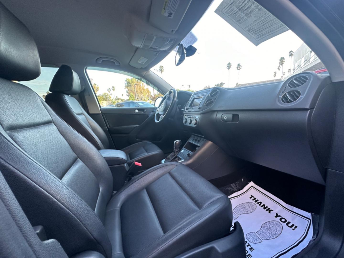 2016 Black /Black Volkswagen Tiguan (WVGAV7AX5GW) , AUTOMATIC transmission, located at 30 S. Berkeley Avenue, Pasadena, CA, 91107, (626) 248-7567, 34.145447, -118.109398 - Crown City Motors is a used “Buy Here Pay Here” car dealer in Pasadena CA. “Buy Here Pay Here” financing, means that when you purchase your vehicle from our dealership, that you make the payments to the dealership as well. We do not need the banks approval to get you approved for a used auto - Photo#15